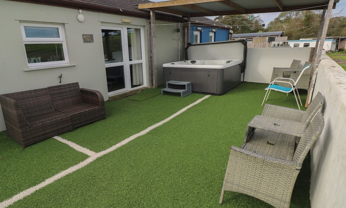 Llanybri Cottage | MEADOW VIEW, pet friendly, with hot tub in Laugharne