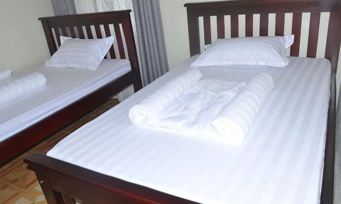 Entebbe Apartment | Migingo Suites Entebbe Airport & Lake view Gem