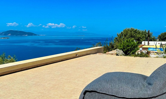 Kontos Condo | Minimalist, new condo with beautiful sea and mountain views