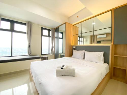 Cikarang Apartment | Minimalist Studio at Pollux Chadstone Apartment By Travelio
