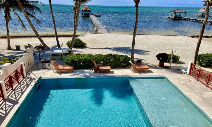 San Pedro Condo | Miramar 8 Gorgeous views with kayaks, pool, pier, palapa, & more!