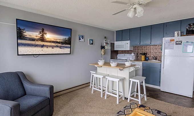 Snowshoe Condo | ML 166: Wonderful mountain views await you in this inviting summer oasis!