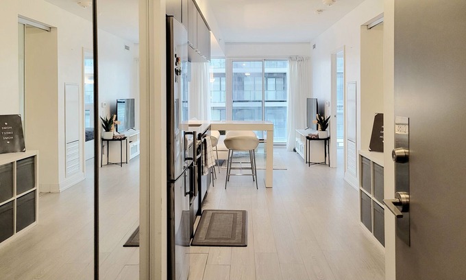 Garden District Condo | Modern 1+1 Bedroom Condo Steps Away from Vibrant Dundas Square