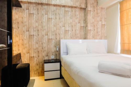 Jatinegara Apartment | Modern 2BR with City View at Bassura Apartment By Travelio
