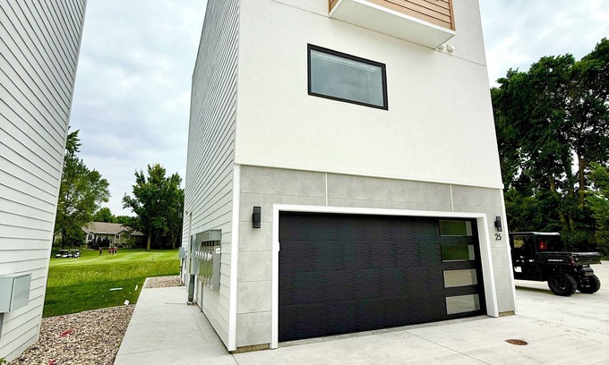 Arnolds Park Condo | Modern 3-Story Condo Across from Arnold’s Park – Walk to Fun, Lake, & Dining!