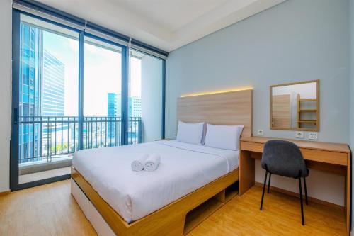 Mampang Prapatan Apartment | Modern and New 1BR across LRT Station Samara Suites Apartment By Travelio