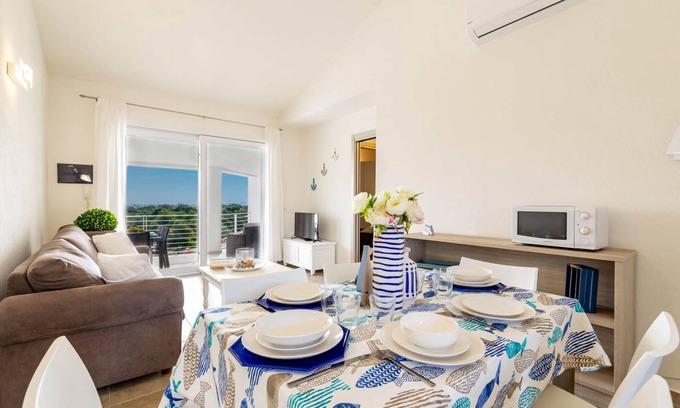 Monte Petrosu Apartment | modern apartment 5 min. from the sea with swimming pool, air conditioning and wi-fi