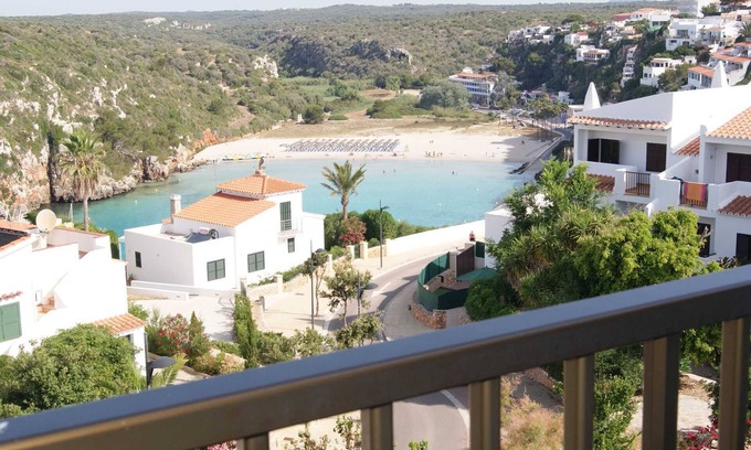 Cala en Porter Apartment | Modern apartment with a fantastic view over the bay