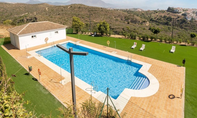 Puerto de la Duquesa House | Modern apartment in Manilva with shared pool and 5 minutes walk of the sea