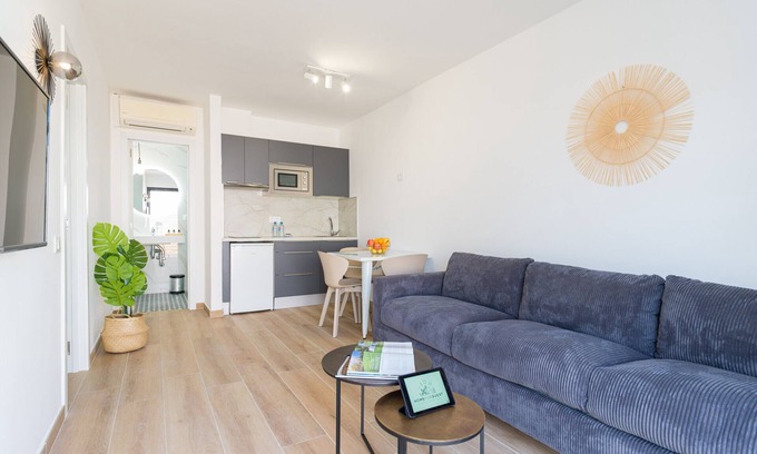 Corralejo Apartment | Modern apartment. Swimming pool and terrace. Right on the beach in Corralejo - Home For Guest