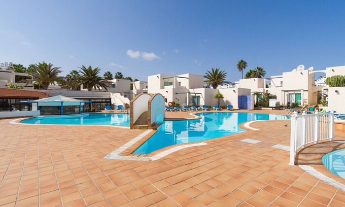 Corralejo Apartment | Modern apartment. Swimming pool and beachfront. Corralejo