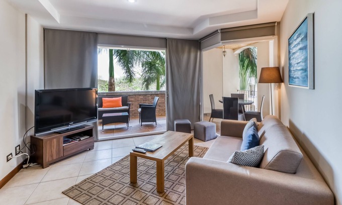 Playa Langosta Condo | Modern condo in Playa Langosta w/shaded terrace & jetted tub -steps to the beach