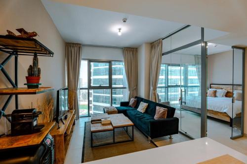 Abu Dhabi Apartment | Modern Glass Suite with City Views Reem Island