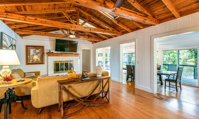 Flat Rock House | Modern lake-front home with dock, furnished deck, pool, tennis & fast WiFi