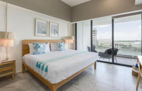 Merida Municipality Apartment | Modern Lakeview Condo with Pool and Gym by LAHOS