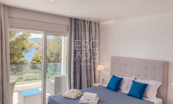 Kosta Villa | Modern minimal villa , walking distance to the beach,amazing sea view