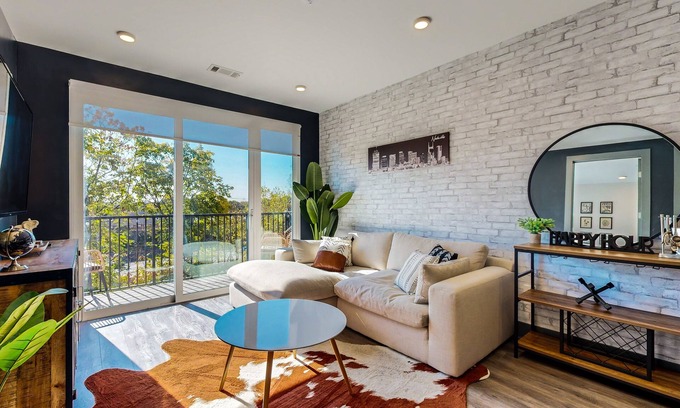 Rolling Mill Hill Condo | Modern Muse downtown condo with private balcony, central AC, & rooftop lounge