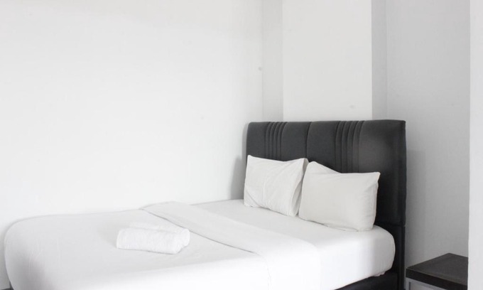Cibaduyut Apartment | Modern & Spacious 1BR at Mekarwangi Square Apartment By Travelio