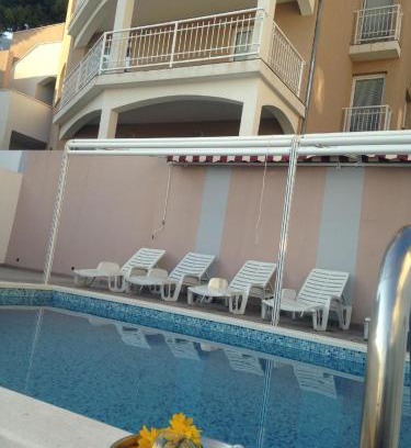 Mimice Apartment | Moderne Ferienwohnung in Mimice mit gemeinsamem Pool, Grill und Terrasse und Meerblick