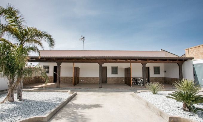 Torre Castiglione House | Mono La Caletta A | outdoor space, a/c
