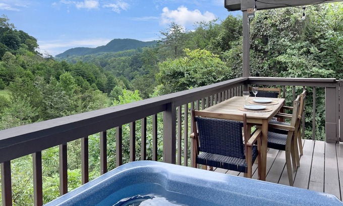 Sevierville Cabin | Mountain View! Dollywood 1 mi! Hot Tub, Fire Pit, King Suites, Arcade, Dogs OK!