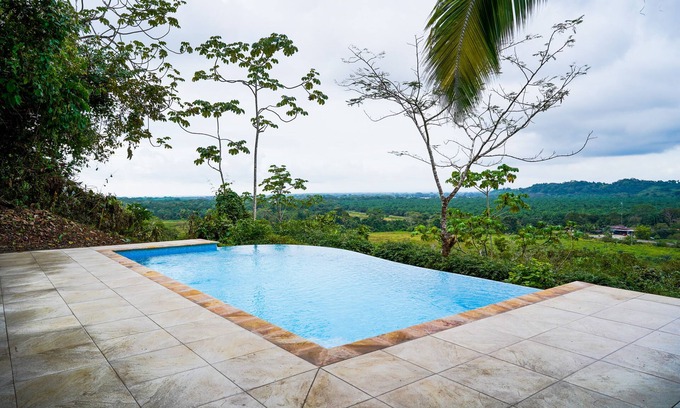 Quepos House | Mountain-view home with private infinity pool & outdoor shower - dog-friendly