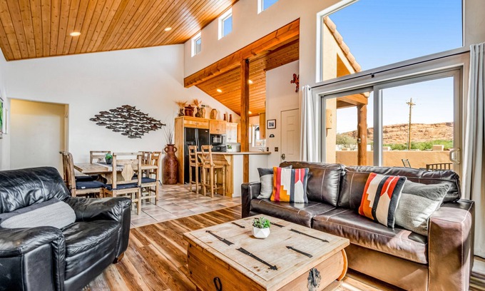 Moab South Valley House | Mountain view home with patio, gas fireplaces & shared pool/hot tub - 2 dogs OK