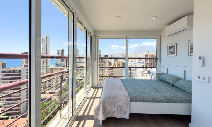 Benidorm Apartment | Mucho Gusto Coblanca 3-16. Sea and mountain view, AC, pool, free parking, WIFI