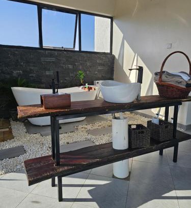 Entebbe Apartment | Muguet by Ibiscot