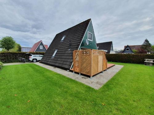 Carolinensiel House | Murmel 4 - Strandkorb, Wallbox, WLan, Kamin