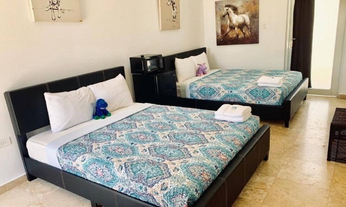 Manati House | MwPi 101 Pool Walk Out Suite / Manati World Point Inn