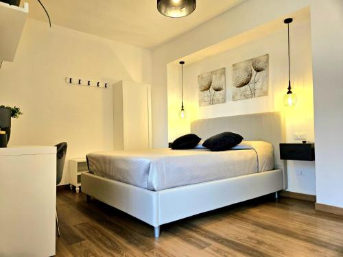 Orosei House | N'Est - Camere di design in centro storico a Orosei