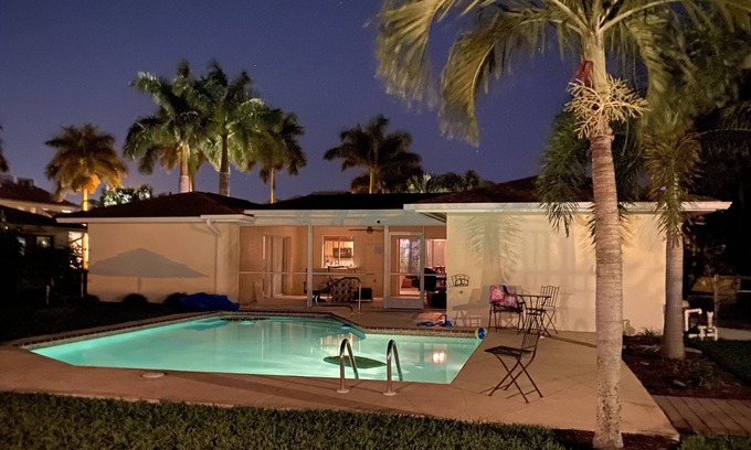 Royal Harbor House | Near Downtown Naples Canal front with 16,000 Lb boat lift, heated pool. Sleeps10