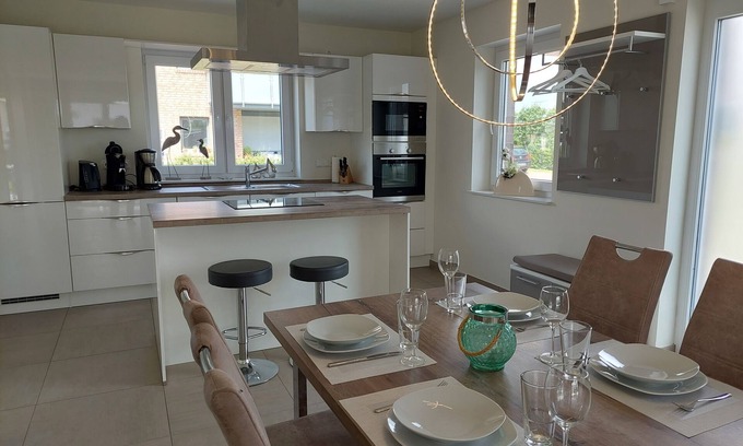 Nordseebad Burhave Apartment | NEW! modern, high-quality, central apartment, sauna, garden, wallbox in Burhave