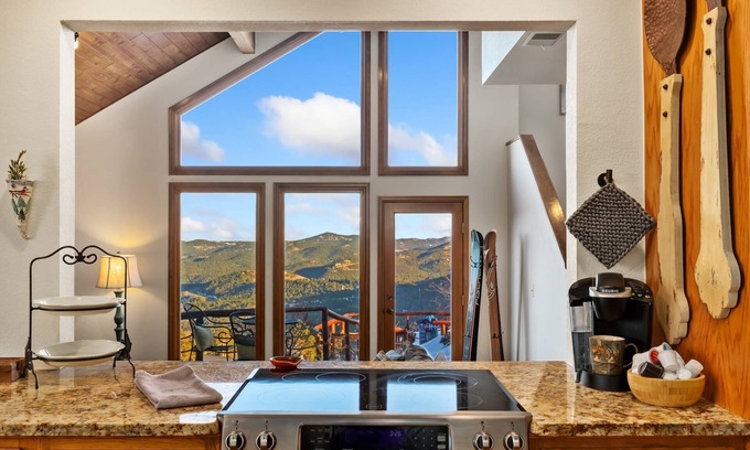 Evergreen House | New! Mountain View. 4 BR. Hot tub. Pets Welcome. Great Views.