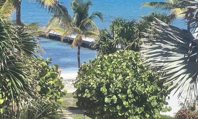 West Bay Villa | NEWLY RENOVATED! beach/ocean views, 2 BR, 2BA, quiet, gorgeous beach.