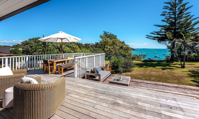 Surfdale House | Newly renovated waterfront home, with large flat lawn leading to the beach.