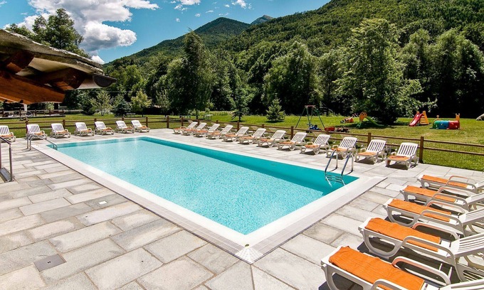 Sampeyre Apartment | Nice apartment for 4 guests with WIFI, pool, TV, terrace and parking
