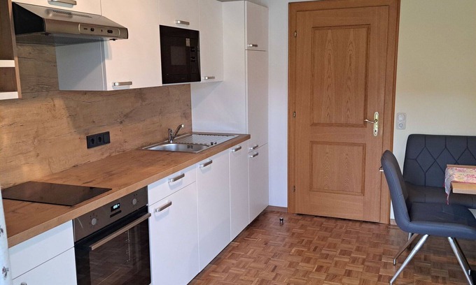 Oberwang Villa | Nice apartment in villa for 4 guests with WIFI, TV and balcony