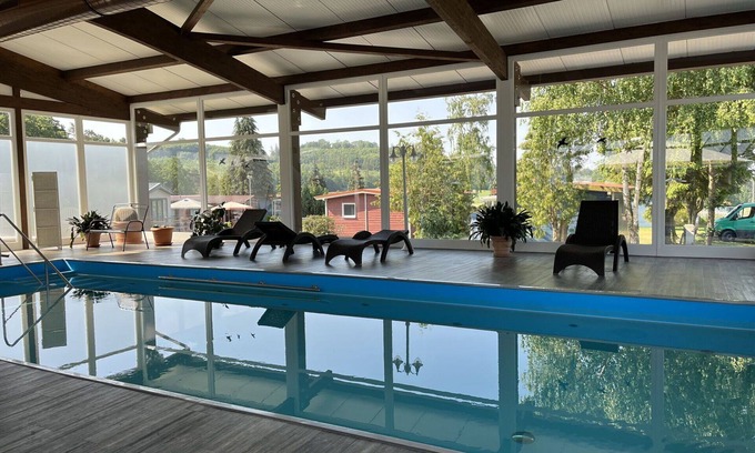 Bad Emstal House | Nice apartment in villa for 5 guests with pool, WIFI, TV, terrace and pets allowed