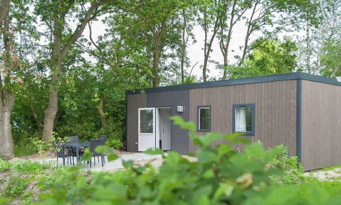 Sint Maartensvlotbrug Ski Chalet | Nicely furnished chalet with dishwasher, close to North Sea