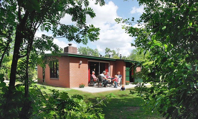 Municipality of Rijssen-Holten House | Nicely furnished bungalow with a fireplace and green area