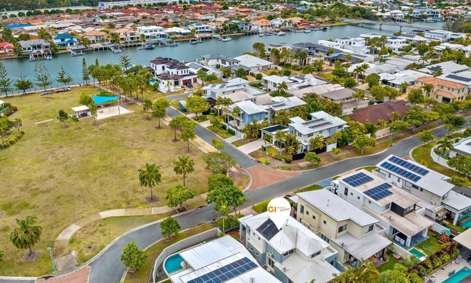 Parrearra House | North-facing double storey home showcasing a delightful outlook across opposite waterfront parkland