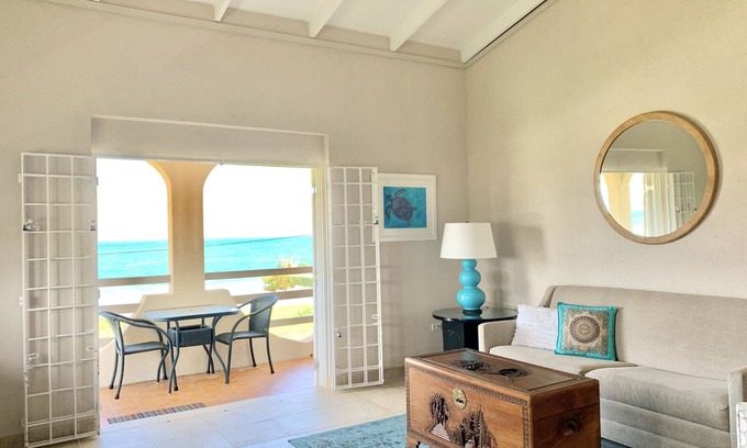Green Garden Apartment | Ocean facing spacious One Bedroom Apt two minutes walk to the beach