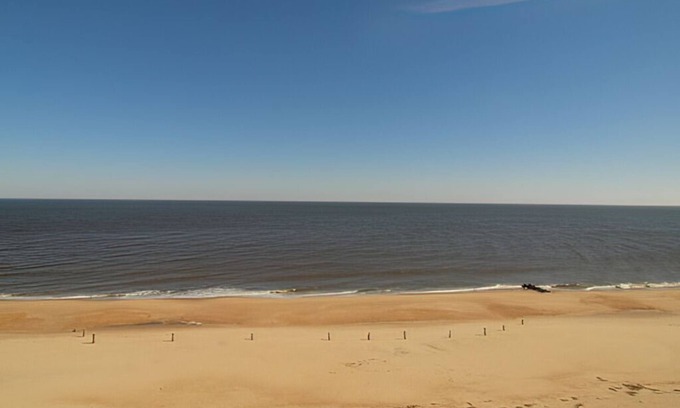 South Rehoboth Condo | OCEAN FRONT CONDO. ENJOY YOUR MORNING COFFEE SITTING ON YOUR PRIVATE BALCONY WATCHING THE SUNRISE.