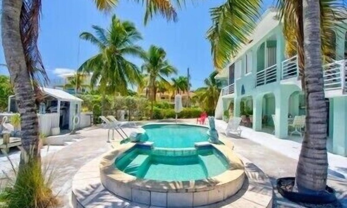 Monroe County Apartment | Ocean Front Views with Boat Dockage Dolphin Encounter Easy Fishing
