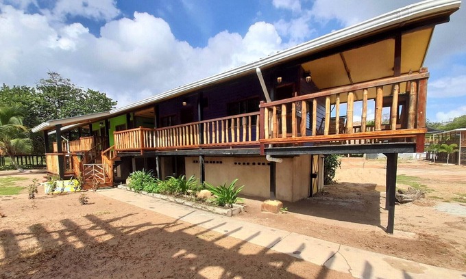 Gales Point Apartment | Ocean View Beachfront Purple Cabana 1, AC, Wi-Fi, Swm Pool Access...