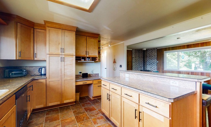 Yachats House | Ocean View Home w/ a Private Hot Tub, Wood Fireplace, Decks, & Garden