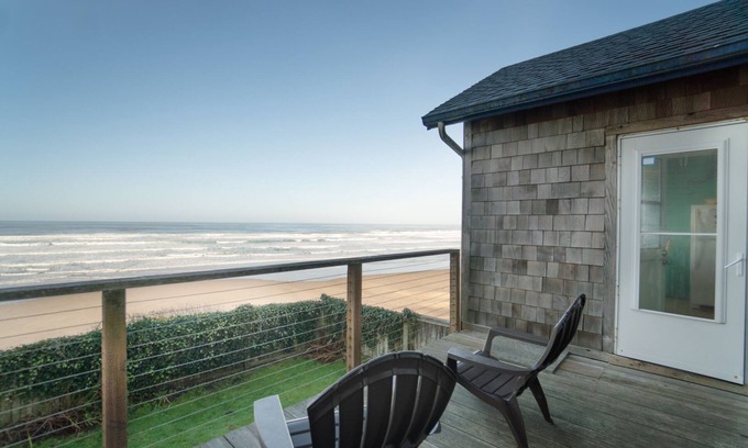 Newport House | Oceanfront beach cabin, enjoy beach views and the deck at this pet friendly home
