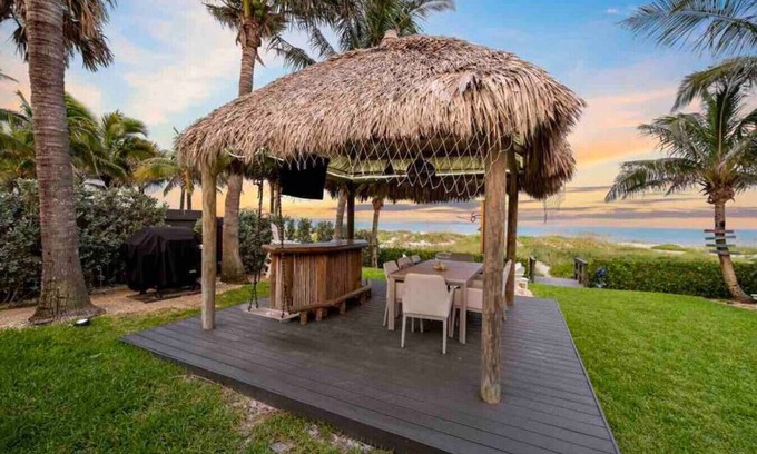 Cocoa Beach Apartment | Oceanfront Cocoa Beach Vacation Home | Private Beach, Tiki Bar & Family Fun